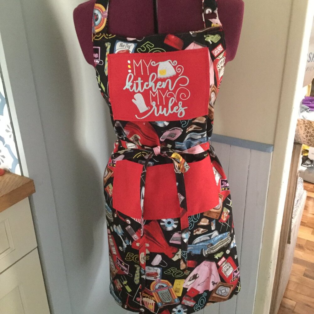 Hand made embroidered graphic 100% cotton adjustable neck strap front pocket